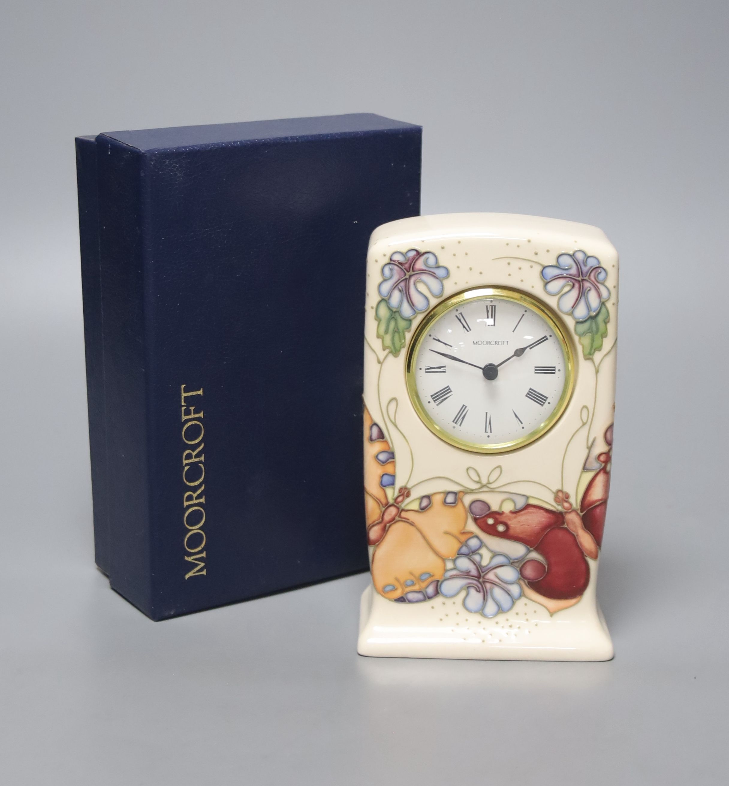 A Moorcroft mantel clock in box